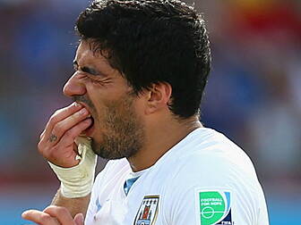 WATCH: Luis Suarez pretends to...